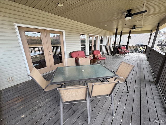 wooden terrace with french doors and ceiling fan