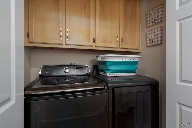 1606 Mallard Cir, Tuscaloosa, AL 35405 - clothes washing area with separate washer and dryer and cabinet space