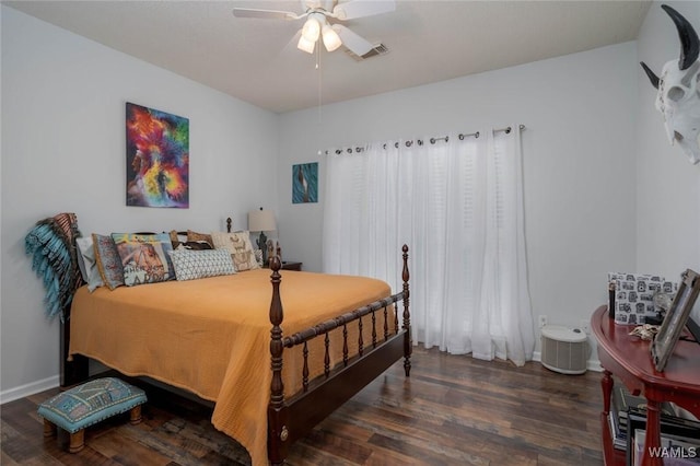 1606 Mallard Cir, Tuscaloosa, AL 35405 - bedroom featuring wood finished floors, a ceiling fan, and baseboards