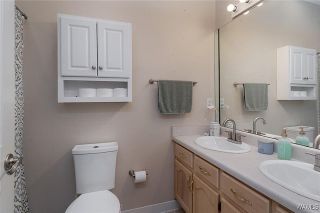 1606 Mallard Cir, Tuscaloosa, AL 35405 - full bathroom featuring toilet and double vanity