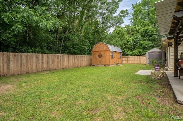 1606 Mallard Cir, Tuscaloosa, AL 35405 - view of yard with a storage unit and an outdoor structure