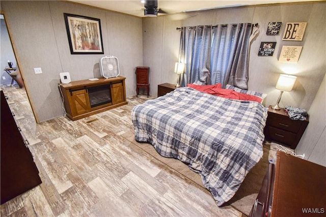 14371 Paul Mills Rd, Buhl, AL 35446 - bedroom with light wood finished floors and a ceiling fan