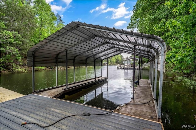 view of dock with a water view and boat lift