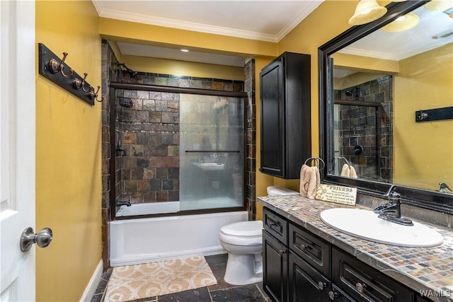full bath with vanity, toilet, enclosed tub / shower combo, baseboards, and ornamental molding