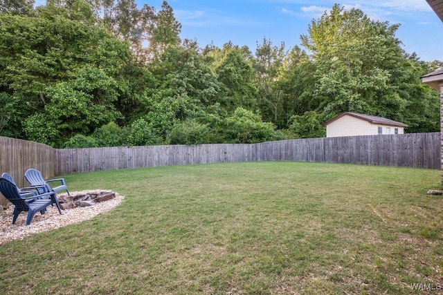 13782 Highland Pointe Dr, Northport, AL 35475 - view of yard featuring an outdoor fire pit