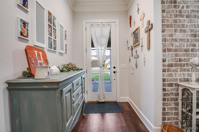 13782 Highland Pointe Dr, Northport, AL 35475 - foyer entrance featuring dark wood-style flooring, crown molding, and baseboards