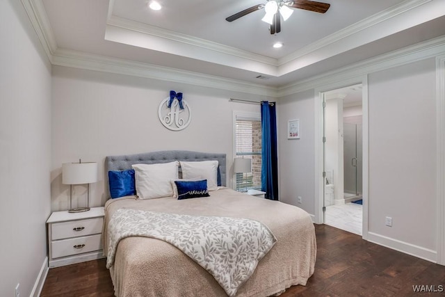 13782 Highland Pointe Dr, Northport, AL 35475 - bedroom featuring wood finished floors, baseboards, a tray ceiling, ensuite bath, and ornamental molding