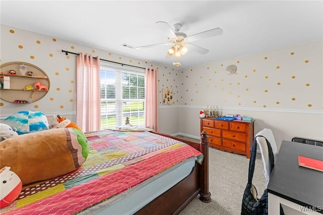 bedroom featuring wallpapered walls, carpet, and a ceiling fan