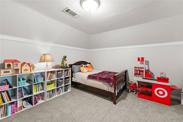 carpeted bedroom featuring baseboards