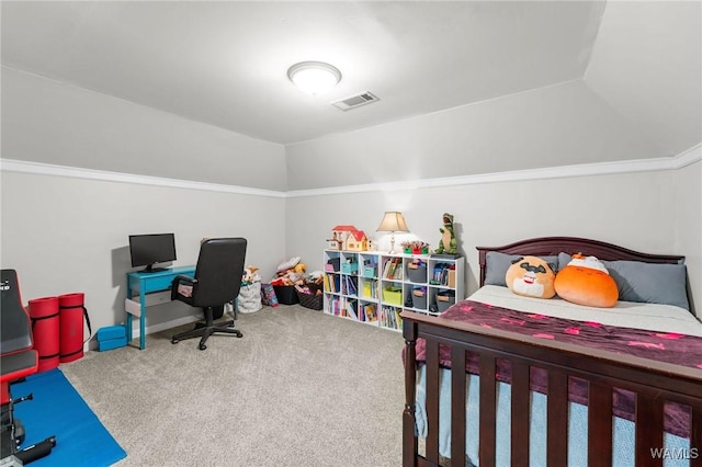 carpeted bedroom featuring vaulted ceiling and baseboards