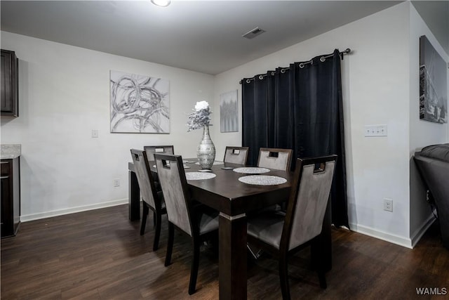 11621 Cedar Glades Dr, Vance, AL 35490 - dining space featuring dark wood finished floors and baseboards