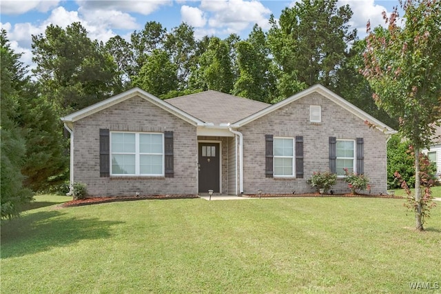 11621 Cedar Glades Dr, Vance, AL 35490 - ranch-style house with brick siding and a front yard