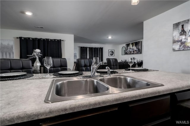 11621 Cedar Glades Dr, Vance, AL 35490 - kitchen with open floor plan, a sink, light countertops, and recessed lighting
