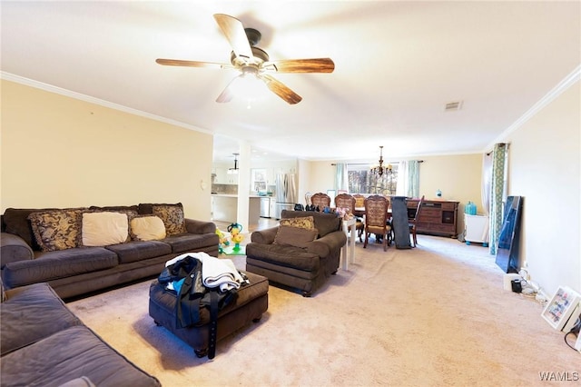 living room with crown molding, light colored carpet, and ceiling fan with notable chandelier