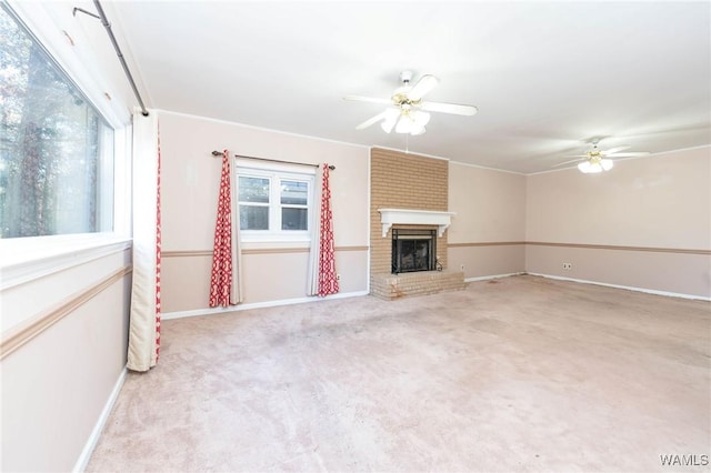 unfurnished living room with light carpet, a brick fireplace, and ceiling fan