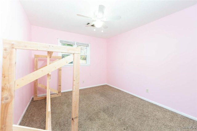 unfurnished bedroom featuring carpet flooring and ceiling fan