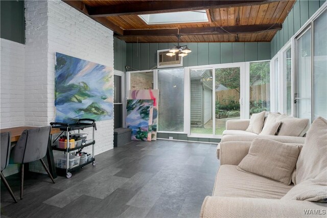 5324 Northwood Lake Dr W, Northport, AL 35473 - sunroom / solarium featuring a wood ceiling with exposed beams, a skylight, and a chandelier