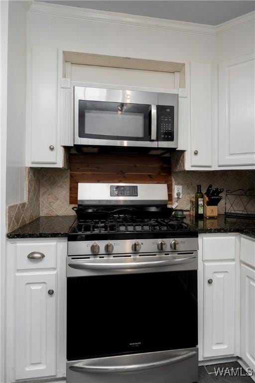 5324 Northwood Lake Dr W, Northport, AL 35473 - kitchen featuring stainless steel appliances, white cabinetry, crown molding, and decorative backsplash