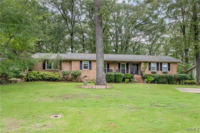 5324 Northwood Lake Dr W, Northport, AL 35473 - single story home featuring a front yard, brick siding, and a porch