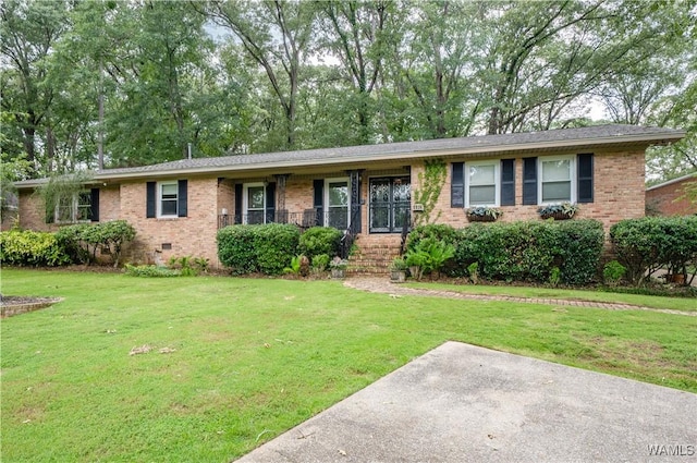 5324 Northwood Lake Dr W, Northport, AL 35473 - ranch-style house with brick siding, a front yard, and crawl space