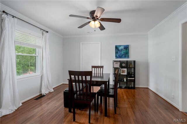 5324 Northwood Lake Dr W, Northport, AL 35473 - dining area with wood finished floors, crown molding, and a ceiling fan
