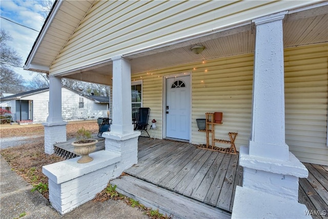 entrance to property with covered porch