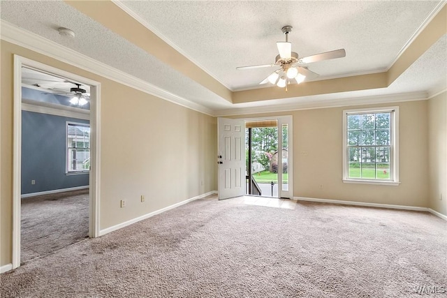 7714 Thompsons Way, Northport, AL 35473 - carpeted empty room with a tray ceiling, a textured ceiling, a ceiling fan, crown molding, and a smoke detector