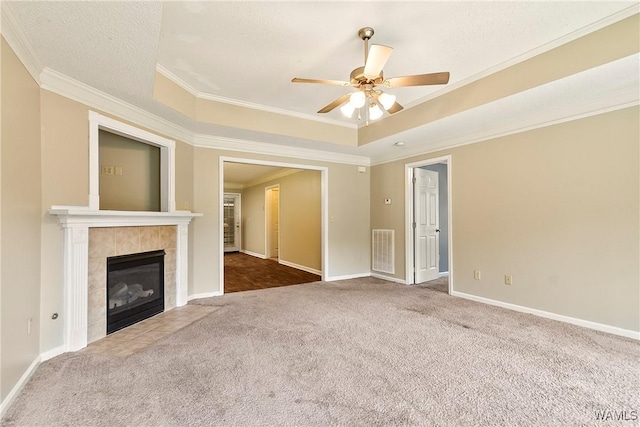7714 Thompsons Way, Northport, AL 35473 - unfurnished living room with carpet floors, crown molding, a ceiling fan, and a fireplace