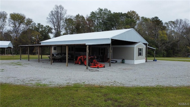 view of outdoor structure featuring a lawn