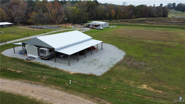 birds eye view of property with a rural view