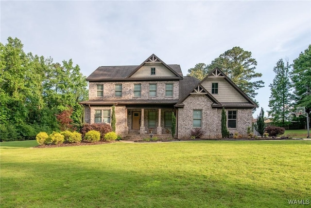 10998 Sleepy Valley Rd, Northport, AL 35475 - craftsman-style home featuring a porch, brick siding, and a front yard