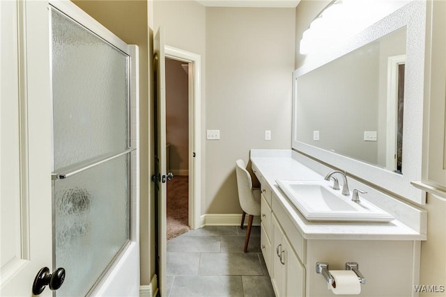 10998 Sleepy Valley Rd, Northport, AL 35475 - bathroom with vanity, tile patterned flooring, and baseboards