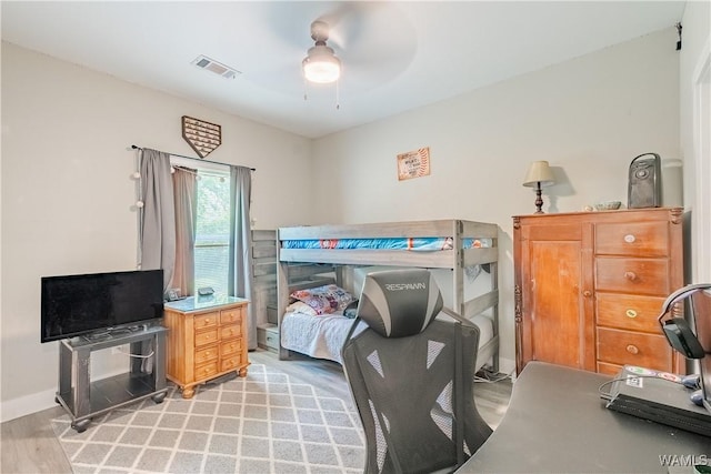 16471 Chase Cir, Ralph, AL 35480 - bedroom featuring light wood-style flooring, a desk, a ceiling fan, and baseboards