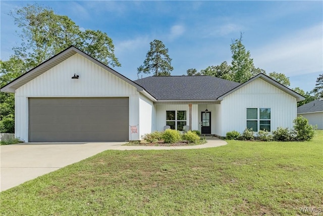 16471 Chase Cir, Ralph, AL 35480 - view of front of property with a front lawn, an attached garage, driveway, and a shingled roof