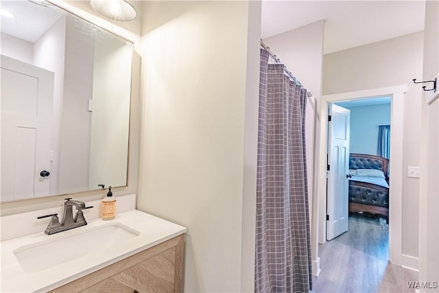 16471 Chase Cir, Ralph, AL 35480 - full bathroom featuring wood finished floors, vanity, a shower with curtain, and ensuite bath