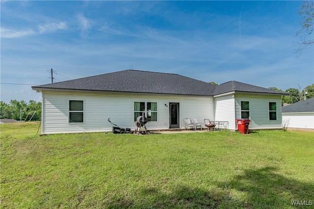 16471 Chase Cir, Ralph, AL 35480 - back of property with a yard and roof with shingles