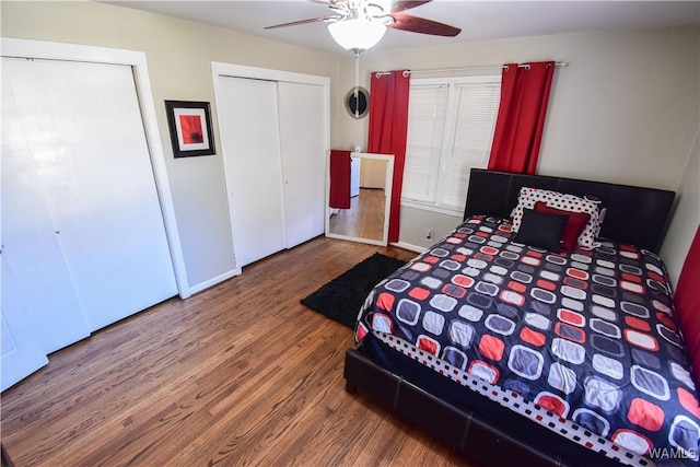 bedroom featuring ceiling fan, baseboards, and wood finished floors