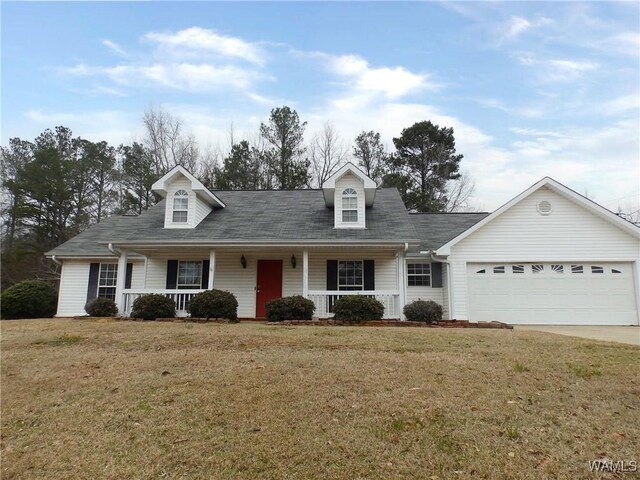 cape cod home with a porch, a front lawn, and a garage