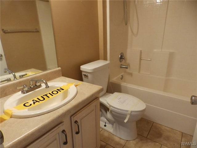 full bathroom with toilet, tile patterned flooring, vanity, and shower / tub combination