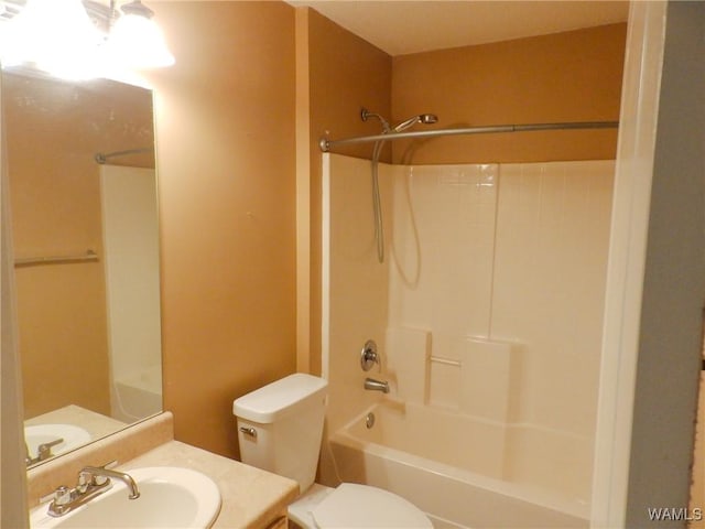 full bathroom with vanity, toilet, and shower / bathtub combination