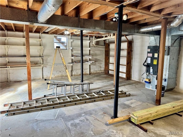 basement featuring heating unit