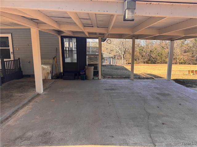 view of patio featuring a carport