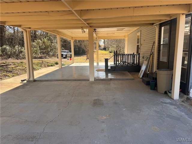 view of patio / terrace featuring a carport