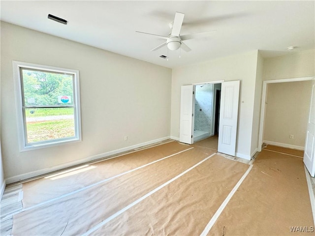 11700 Cripple Creek Rd, Berry, AL 35546 - unfurnished bedroom with light colored carpet, baseboards, and ceiling fan