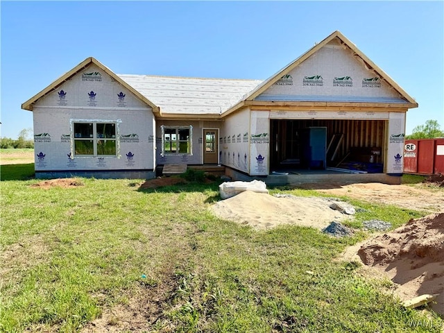 property under construction with a front lawn