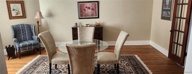 dining area featuring hardwood / wood-style flooring