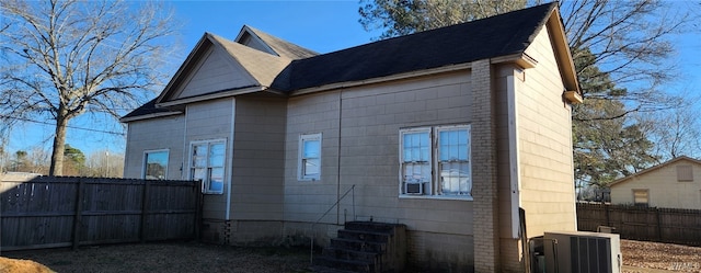 view of home's exterior with cooling unit