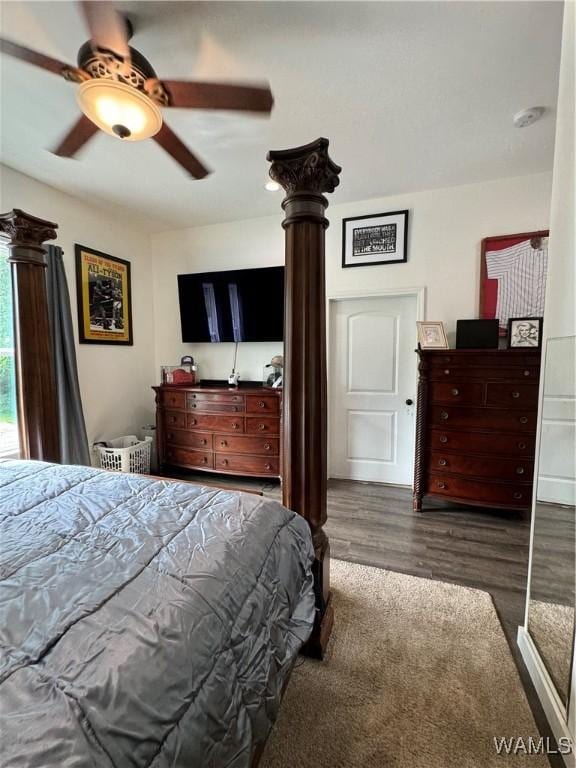 bedroom with a ceiling fan and wood finished floors