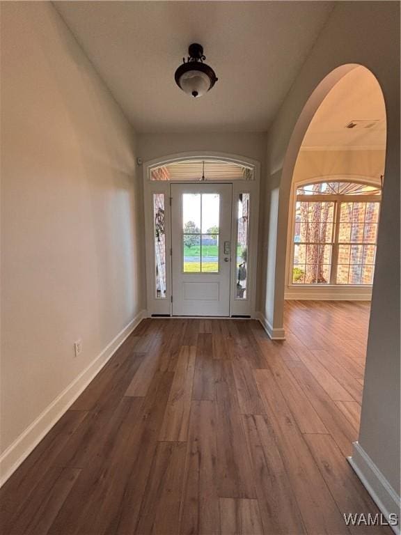 5203 Bristolwood Cir, Northport, AL 35475 - entrance foyer featuring hardwood / wood-style flooring and arched walkways