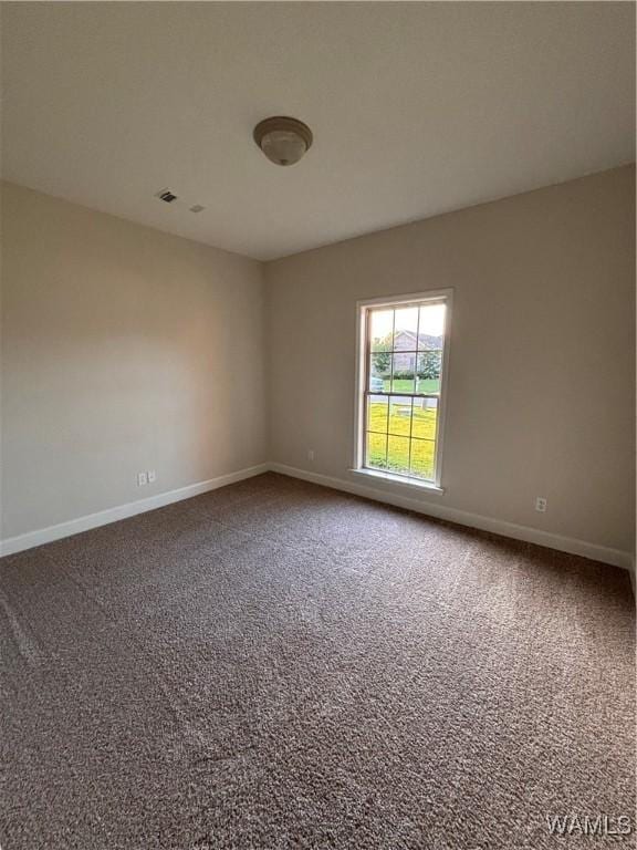 5203 Bristolwood Cir, Northport, AL 35475 - empty room with baseboards and carpet